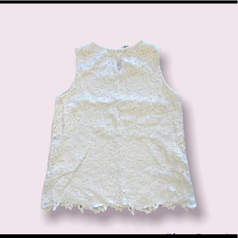 White sleeveless shirt